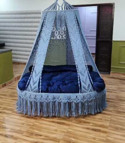 Blue macrame swing bed